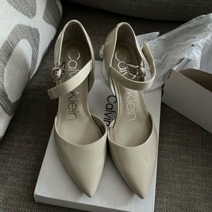 New in box, Calvin Klein patent leather ankle heels straps, ivory size 7.5 M NIB